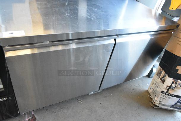BRAND NEW SCRATCH AND DENT! 2024 Avantco 178ZUC60FHC Stainless Steel 60" Front Breathing Undercounter Freezer on Commercial Casters. 115 Volts, 1 Phase. Tested and Working! - Image 1 of 6