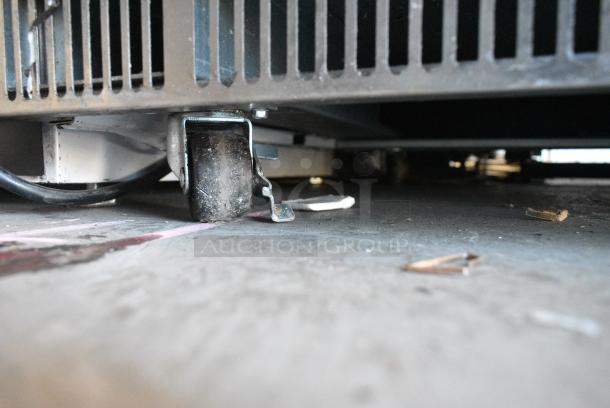 BRAND NEW SCRATCH AND DENT! 2024 Avantco 178ZUC60FHC Stainless Steel 60" Front Breathing Undercounter Freezer on Commercial Casters. 115 Volts, 1 Phase. Tested and Working! - Image 3 of 6