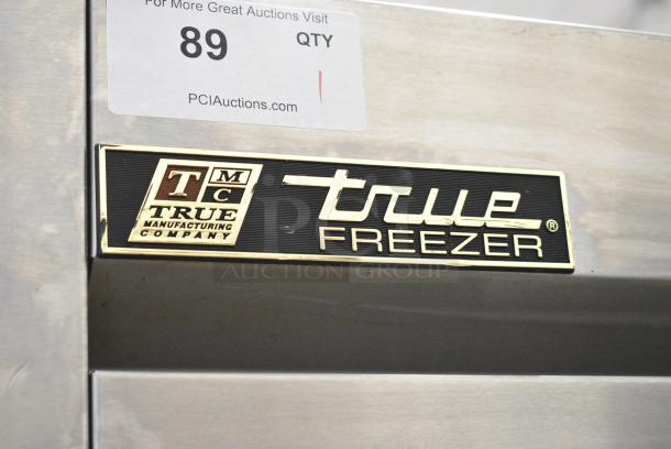 True T-19F Stainless Steel Commercial Single Door Reach In Freezer w/ Poly Coated Racks on Commercial Casters. 1 Caster Needs To Be Reattached. 115 Volts, 1 Phase. Tested and Working! - Image 3 of 5