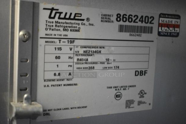 True T-19F Stainless Steel Commercial Single Door Reach In Freezer w/ Poly Coated Racks on Commercial Casters. 1 Caster Needs To Be Reattached. 115 Volts, 1 Phase. Tested and Working! - Image 5 of 5