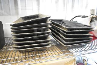 14 Black Ceramic Rectangular Plates. 14 Times Your Bid!