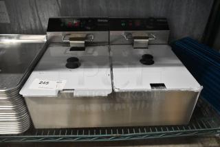 BRAND NEW SCRATCH AND DENT! Galaxy 177EF20E 20 lb. Dual Tank Electric Countertop Fryer w/ 2 Metal Fry Baskets and 2 Metal Lids. 110 Volts, 1 Phase.