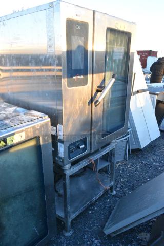2018 Alto Shaam CTP10-10E Stainless Steel Commercial Electric Powered Combi Convection Oven on Equipment Stand. 208-240 Volts, 3 Phase.