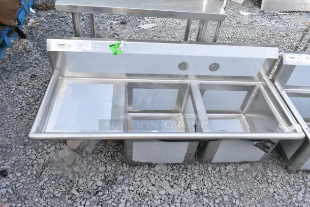 BRAND NEW SCRATCH AND DENT! Regency 600S2171718L 57" 16 Gauge Stainless Steel Two Compartment Commercial Sink w/ 1 Drainboard - 17" x 17" x 12" Bowls - Left Drainboard. No Legs. - Image 1 of 5