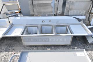 BRAND NEW SCRATCH AND DENT! Regency Spec Line Stainless Steel Three Compartment Commercial Sink with Galvanized Steel Legs and 2 Drainboards. No Legs.