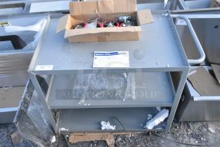 BRAND NEW SCRATCH AND DENT! Lavex Gray Metal 3 Tier Cart w/ Commercial Casters.