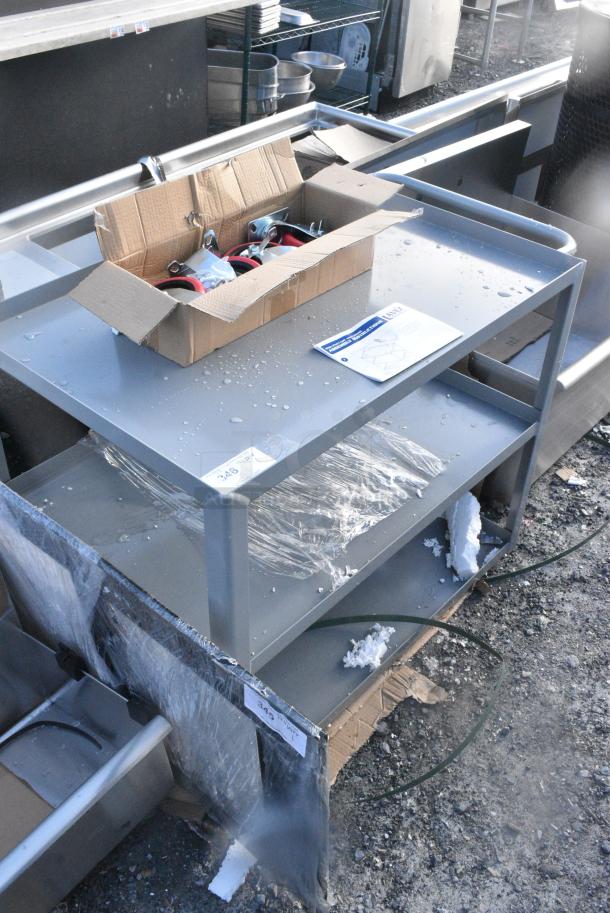 BRAND NEW SCRATCH AND DENT! Lavex Gray Metal 3 Tier Cart w/ Commercial Casters. - Image 2 of 5