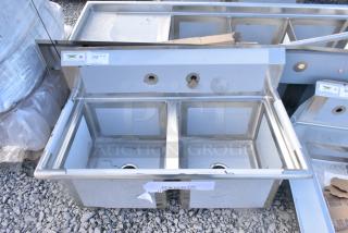 BRAND NEW SCRATCH AND DENT! Regency 600S21717 57" 16 Gauge Stainless Steel Two Compartment Commercial Sink with Galvanized Steel Legs and 1 Drainboard - 17" x 17" x 12" Bowls - Left Drainboard. No Legs.