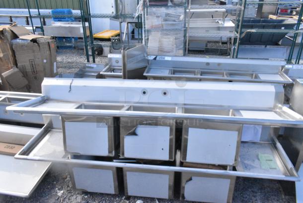 BRAND NEW SCRATCH AND DENT! Regency 600S3181818X 94" 16 Gauge Stainless Steel Three Compartment Commercial Sink with Cross Bracing and 2 Drainboards - 18" x 18" x 14" Bowls. No Legs. - Image 1 of 5
