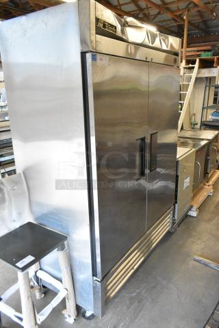 True T-49 Stainless Steel Commercial 2 Door Reach In Cooler w/ Poly Coated Racks. 115 Volts, 1 Phase. Tested and Working!