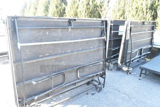 ALL ONE MONEY! Lot of 17 Pieces That Make Up 1 Sico Mobile Fold Up Stage w/ 7 Stage Stairs. Approximately 800 Square Feet.