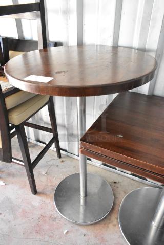 6 Wood Pattern Round Bar Height Table on Metal Table Base. Includes 28x28x43. 6 Times Your Bid!