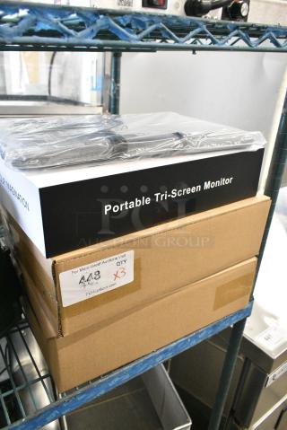 3 BRAND NEW SCRATCH AND DENT! Portable Tri-screen Monitor. 3 Times Your Bid!