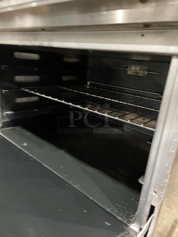 DCS Commercial Stainless Steel Natural Gas Powered 6 Burner Range & Oven Combo! With Back Splash & Overhead Salamander Shelf! With Wired Oven Rack! On Casters! - Image 7 of 9