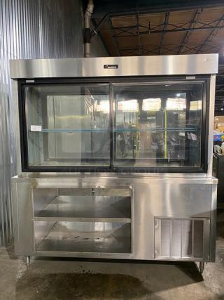Delfield Commercial Stainless Steel Refrigerated Pass-Through Merchandiser Display Showcase! With 2 Tier Storage Base Underneath! With Adjustable Poly Coated Wire Rack! Model: 5PC72N SN: 0402036000912M! 120V 1 Phase! On Legs!