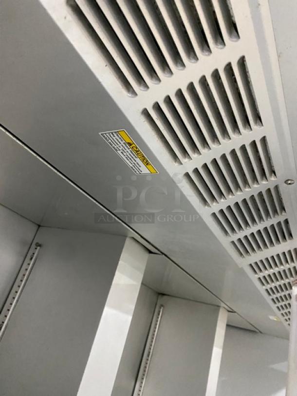 Beverage-Air E-Series Commercial Stainless Steel Solid 3 Door Reach In Refrigerator! With Poly Coated Wire Racks! Model: ER74-1AS SN: 7126683! 115V 1 Phase! On Casters! - Image 7 of 11