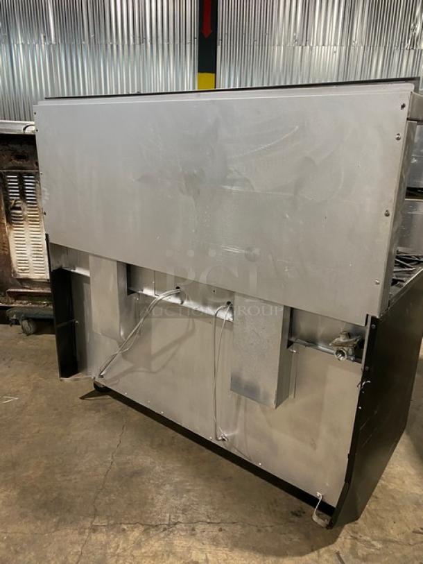 Wow! Garland Commercial Stainless Steel Natural Gas Powered 6 Burner Range/Flat Griddle Split Top & Double Oven Combo! With Back Splash & Overhead Salamander Shelf! With Wired Oven Racks! On Casters! Working When Removed! - Image 3 of 12