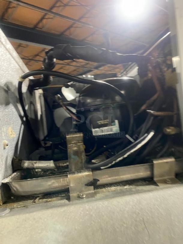 Traulsen Commercial Stainless Steel Solid Single Door Reach In Freezer! With Poly Coated Wire Racks! Model: G12010 SN: T93868D05! 115V 1 Phase! On Casters! - Image 9 of 9