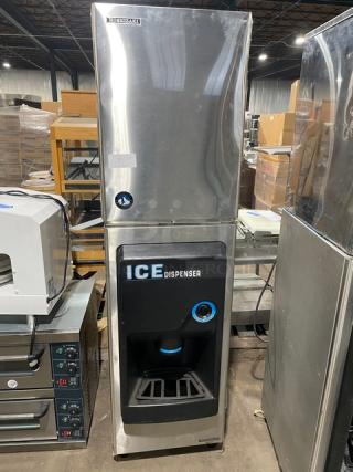 Hoshizaki Commercial Stainless Steel Modular Cresent Cuber Ice Machine Head! Model: KM-500MWH SN: Q03845E!  115-120V 1 Phase! With Hoshizaki Commercial Stainless Steel Ice Dispensing Bin Underneath! Model:  DB-130H SN: Q52291G! 115V 1 Phase! On Legs!