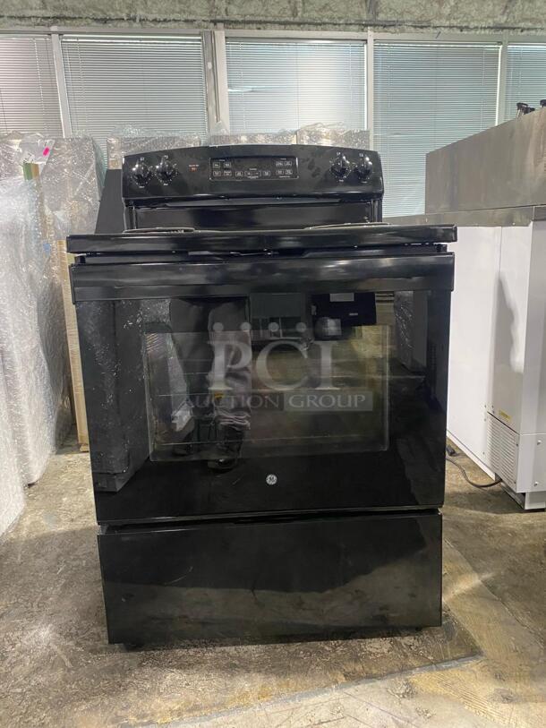 GE Freestanding ELECTRIC RANGE: with 4 Coil Burners, 5.0 cu. ft. Oven Capacity, Storage Drawer, Sensi-Temp Technology, Dual-Element Bake, Sabbath Mode, and Self-Clean: Black - Image 1 of 4