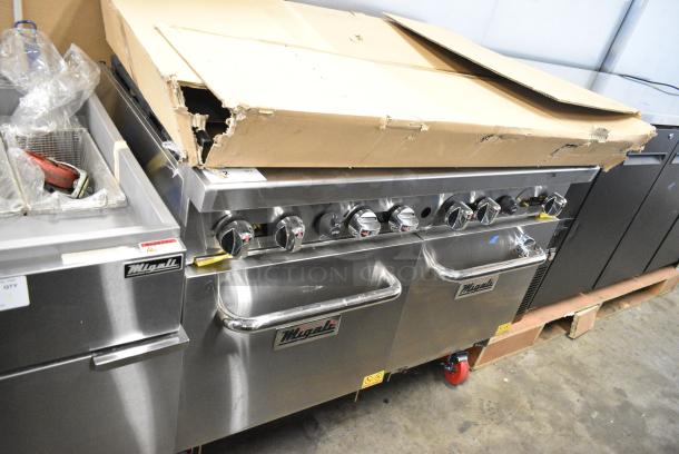 BRAND NEW! Migali C-RO8-LP Stainless Steel Commercial Propane Gas Powered 8 Burner Range w/ 2 Ovens and Back Splash on Commercial Casters. 184,000 BTU. Serial C-RO8-LPUSB200322081200920002 - Image 2 of 12