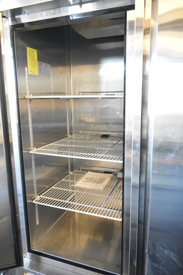 BRAND NEW! Javar STH49BR Stainless Steel Commercial 2 Door Reach In Cooler w/ Poly Coated Racks on Commercial Casters. 115 Volts, 1 Phase. Serial ST2300201ST54R22A001. Tested and Working! - Image 4 of 8