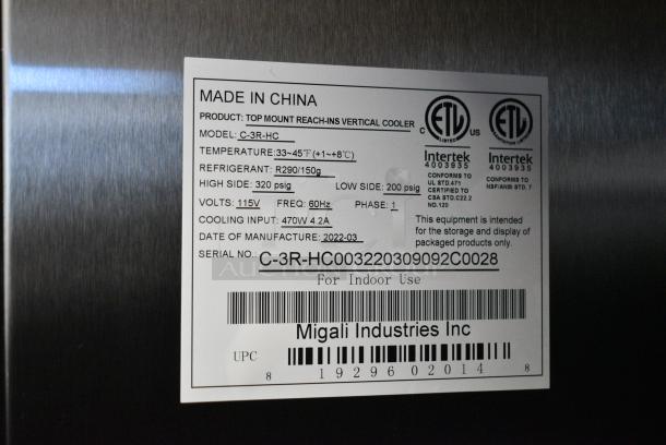 BRAND NEW! 2022 Migali C-3R-HC Stainless Steel Commercial 3 Door Reach In Cooler w/ Poly Coated Racks on Commercial Casters. 115 Volts, 1 Phase. Serial C-3R-HC003220309092C0028. Tested and Working! - Image 8 of 8