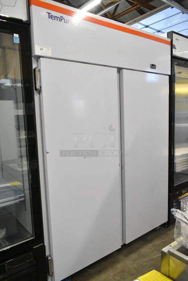 BRAND NEW! 2023 Migali EVOx-2F Stainless Steel Commercial 2 Door Reach In Freezer w/ Poly Coated Racks on Commercial Casters. 208/230 Volts, 1 Phase. Serial 10156832 - Image 1 of 6