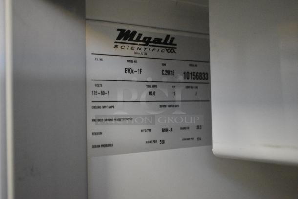 BRAND NEW! Migali EVOx-1F Metal Commercial Single Door Reach In Freezer w/ Poly Coated Racks on Commercial Casters. 115 Volts, 1 Phase. Serial 10156833. Tested and Powers On But Does Not Get Cold - Image 5 of 5
