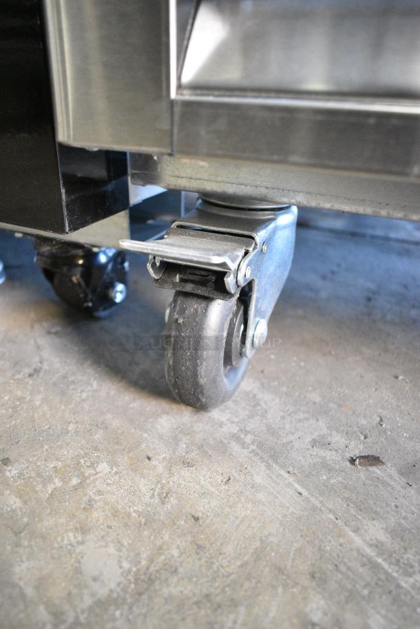 BRAND NEW! 2022 Migali C-2RB-HC Stainless Steel Commercial 2 Door Reach In Cooler w/ Poly Coated Racks on Commercial Casters. 115 Volts, 1 Phase. Serial C-2RB-HCT03220730092T0007. Tested and Working! - Image 4 of 7