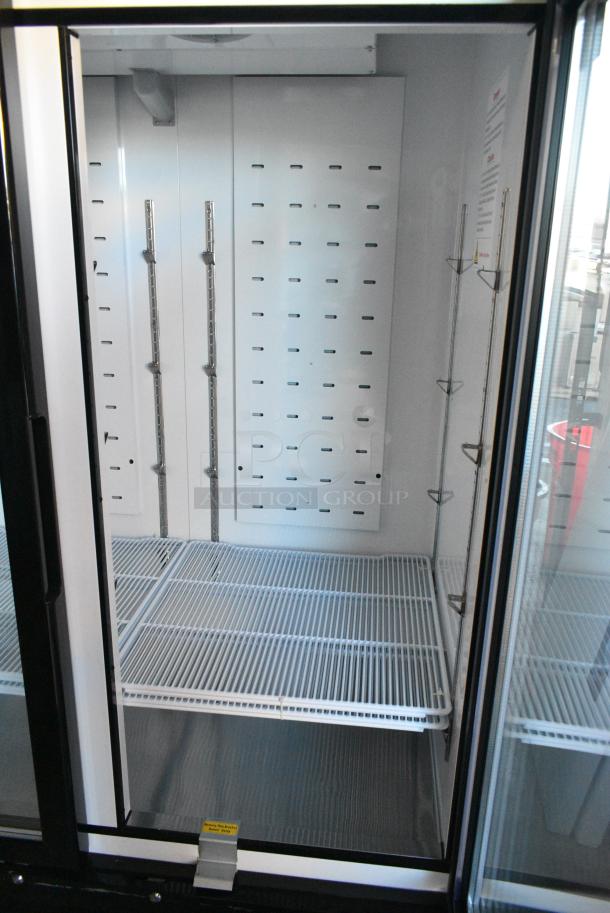 BRAND NEW! 2022 Migali C-49FM-HCe Metal Commercial 2 Door Reach In Freezer Merchandiser w/ Poly Coated Racks on Commercial Casters. 115 Volts, 1 Phase. Serial C-49FM-HCe003221220092C0007. Tested and Working! - Image 6 of 7