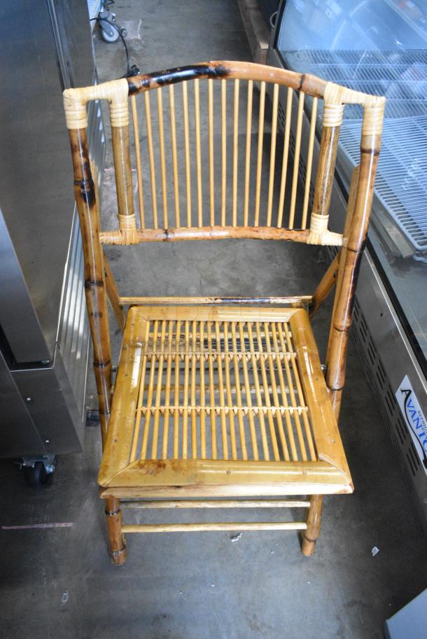 BRAND NEW SCRATCH AND DENT! Box of 4 Tortoise Wooden Folding Chairs. - Image 1 of 3