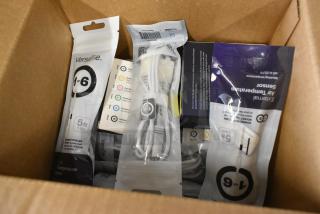 Box of Various BRAND NEW Items Including VersaTile Smart Monitor, Cords