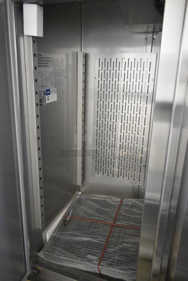 BRAND NEW SCRATCH AND DENT! 2024 Avantco 178SS3RHC Stainless Steel Commercial 3 Door Reach In Cooler w/ Poly Coated Racks on Commercial Casters. 115 Volts, 1 Phase. Tested and Working! - Image 4 of 7