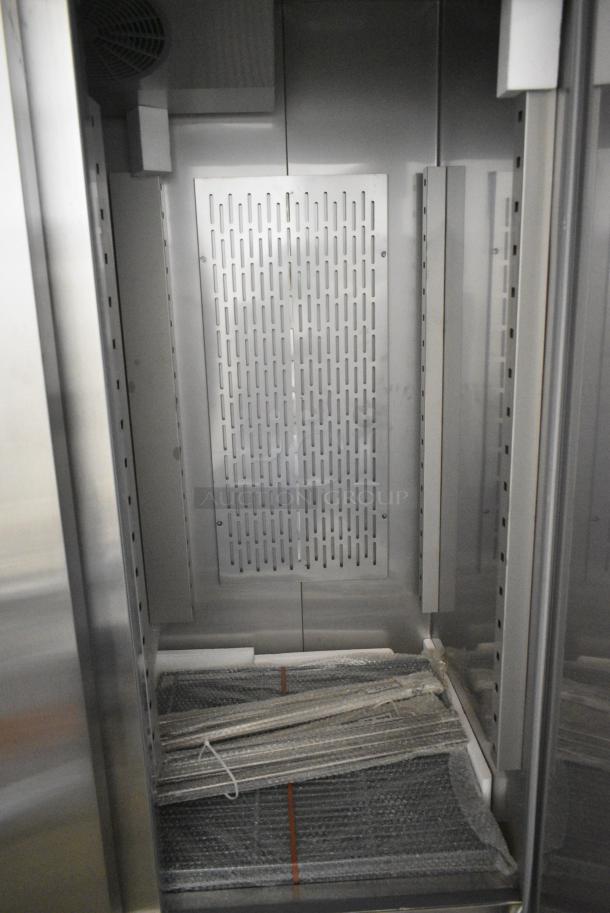 BRAND NEW SCRATCH AND DENT! 2024 Avantco 178SS3RHC Stainless Steel Commercial 3 Door Reach In Cooler w/ Poly Coated Racks on Commercial Casters. 115 Volts, 1 Phase. Tested and Working! - Image 6 of 7