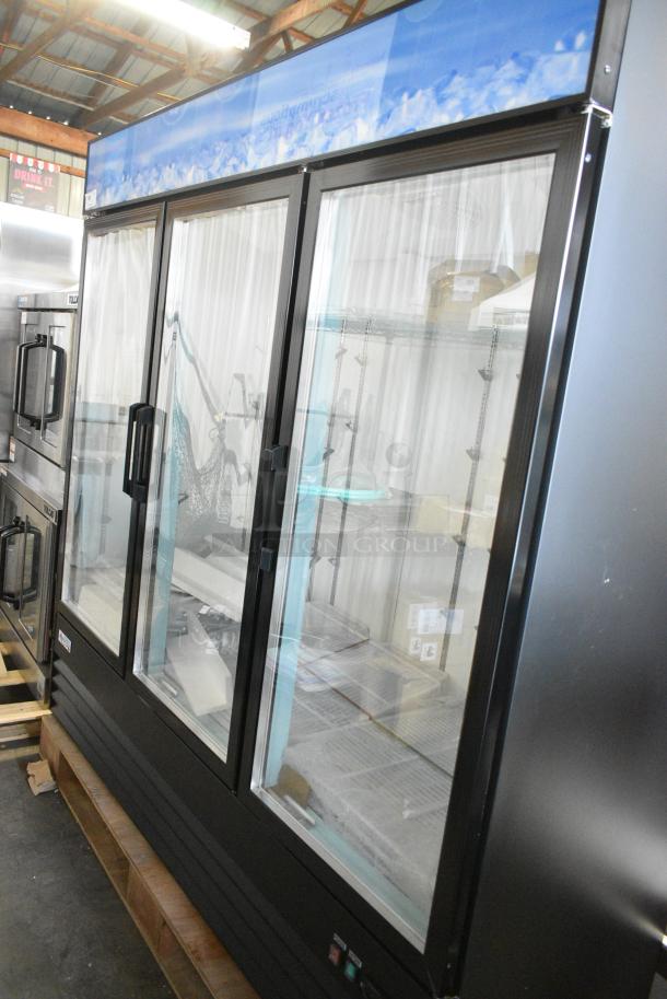 BRAND NEW SCRATCH AND DENT! 2024 Avantco 178GDC69HCB Metal Commercial 3 Door Reach In Cooler Merchandiser w/ Poly Coated Racks. 115 Volts, 1 Phase. Tested and Working! - Image 1 of 6