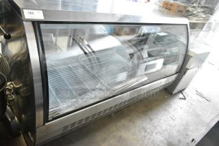 BRAND NEW SCRATCH AND DENT! 2023 Avantco 178DLC82HCS 82" Stainless Steel Curved Glass Refrigerated Deli Case Merchandiser. 115 Volts, 1 Phase. Tested and Working!