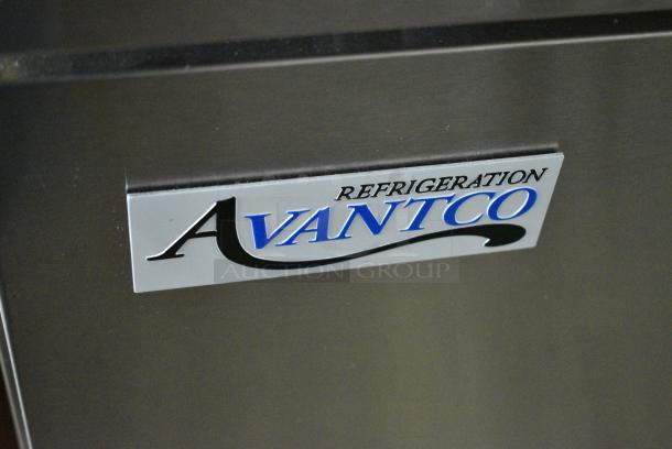 BRAND NEW SCRATCH AND DENT! 2024 Avantco 178SSPPT3 Stainless Steel Commercial 3 Door Refrigerated Pizza Prep Table on Commercial Casters. 115 Volts, 1 Phase. Tested and Working! - Image 3 of 13