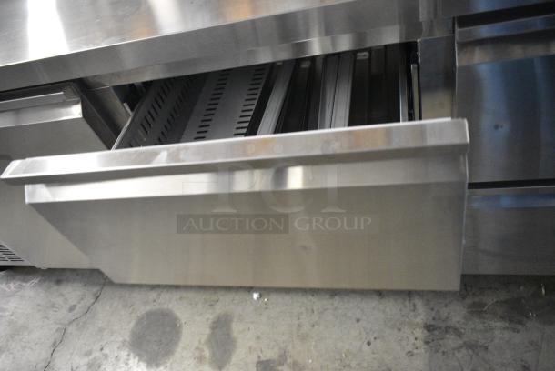 BRAND NEW SCRATCH AND DENT! 2024 Avantco 178SSPPT3 Stainless Steel Commercial 3 Door Refrigerated Pizza Prep Table on Commercial Casters. 115 Volts, 1 Phase. Tested and Working! - Image 8 of 13