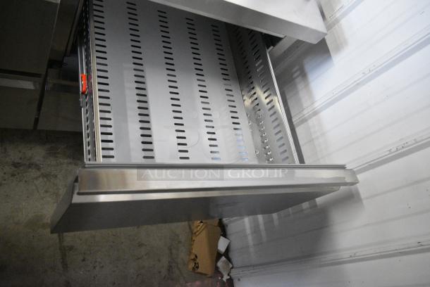 BRAND NEW SCRATCH AND DENT! 2024 Avantco 178SSPPT3 Stainless Steel Commercial 3 Door Refrigerated Pizza Prep Table on Commercial Casters. 115 Volts, 1 Phase. Tested and Working! - Image 10 of 13
