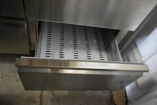 BRAND NEW SCRATCH AND DENT! 2024 Avantco 178SSPPT3 Stainless Steel Commercial 3 Door Refrigerated Pizza Prep Table on Commercial Casters. 115 Volts, 1 Phase. Tested and Working! - Image 11 of 13