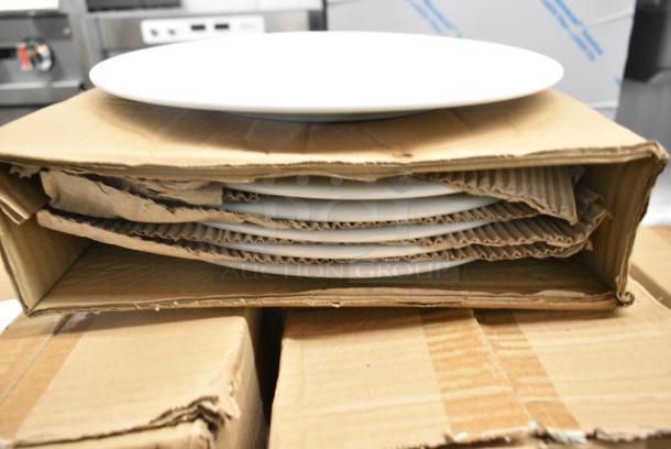 7 BRAND NEW SCRATCH AND DENT! Boxes of 12 Steelite 6900E502 Varick Classic Cafe from Steelite International 10 5/8" Bright White Wide Rim Plate. 7 Times Your Bid! - Image 2 of 4