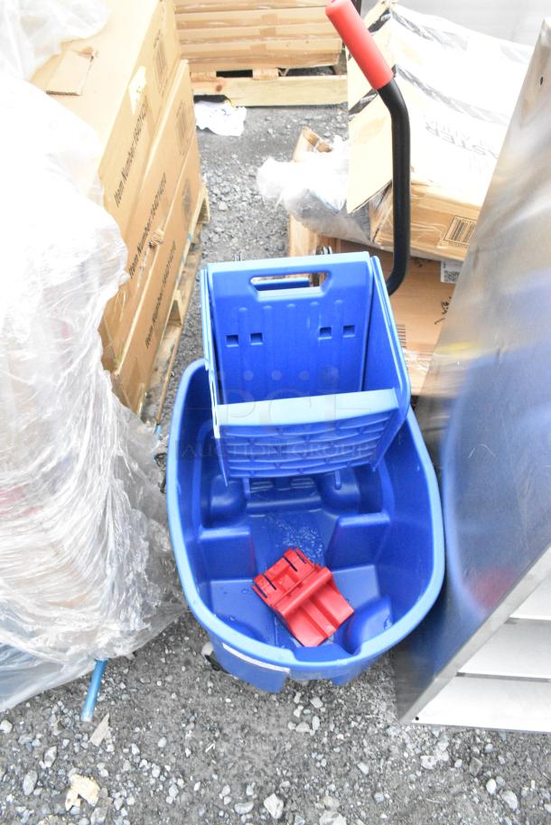 BRAND NEW SCRATCH AND DENT! Rubbermaid Blue Poly Mop Bucket w/ Wringing Attachment on Commercial Casters - Image 1 of 6