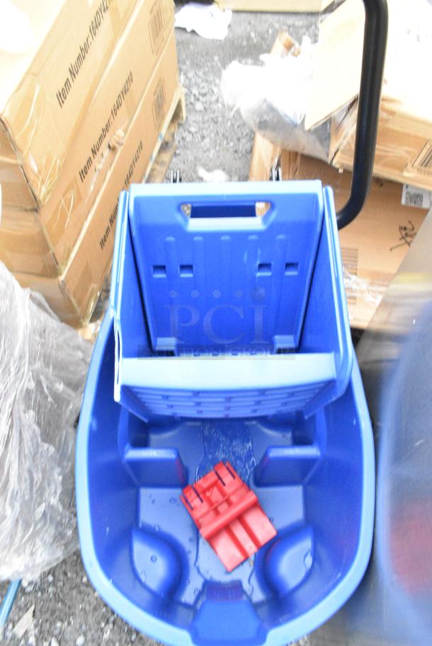 BRAND NEW SCRATCH AND DENT! Rubbermaid Blue Poly Mop Bucket w/ Wringing Attachment on Commercial Casters - Image 3 of 6