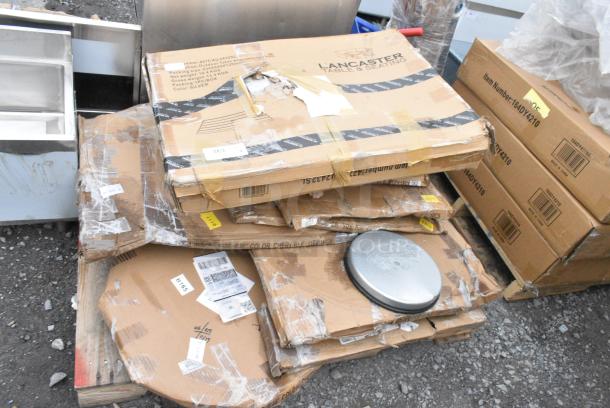 9 BRAND NEW SCRATCH AND DENT! Items Including 427CAU2432SL Lancaster Table & Seating 24" x 32" Silver Powder-Coated Aluminum Dining Height Outdoor Table with Umbrella Hole, 164RS36SS Lancaster Table & Seating Stainless Steel Silver 36" Crowd Control / Guidance Stanchion with 78" Retractable Belt, 600LEGSS711 Regency 28" Stainless Steel Leg for Work Tables - 5" Casters Required, 2 34924RTCB Lancaster Table & Seating 24" Laminated Round Table Top Reversible Cherry / Black. 9 Times Your Bid! - Image 1 of 8