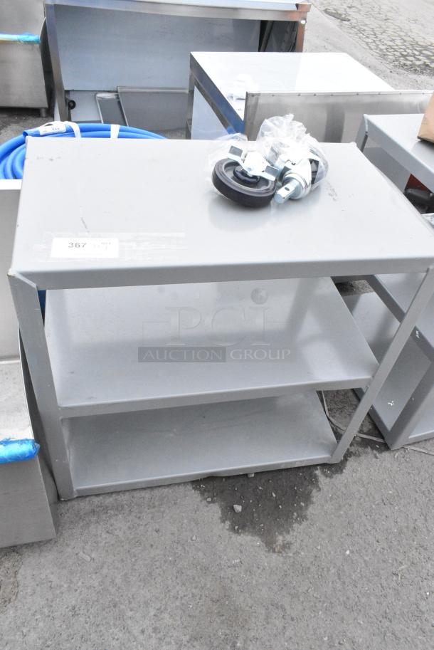 BRAND NEW SCRATCH AND DENT! Lavex Gray Metal 3 Tier Cart w/ 2 Commercial Casters. - Image 1 of 4