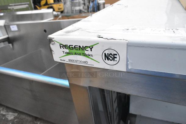 BRAND NEW SCRATCH AND DENT! Regency 600EBT3048D 30" x 48" 16 Gauge Type 304 Stainless Steel Enclosed Base Table with Sliding Doors and Adjustable Midshelf - Image 4 of 4