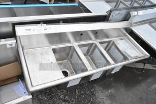 BRAND NEW SCRATCH AND DENT! Regency 600S31014212 58" 16-Gauge Stainless Steel Three Compartment Commercial Sink with Galvanized Steel Legs and 2 Drainboards - 10" x 14" x 10" Bowls. No Legs.