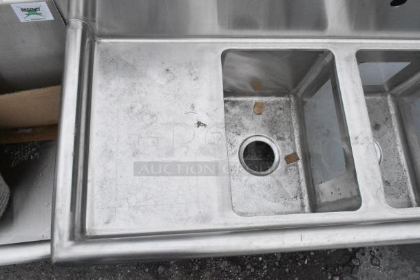 BRAND NEW SCRATCH AND DENT! Regency 600S31014212 58" 16-Gauge Stainless Steel Three Compartment Commercial Sink with Galvanized Steel Legs and 2 Drainboards - 10" x 14" x 10" Bowls. No Legs. - Image 2 of 5