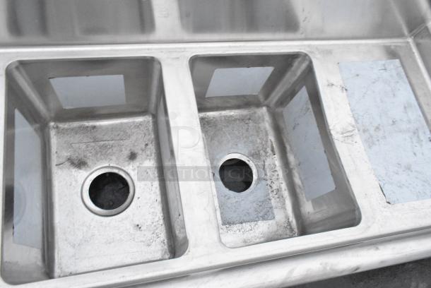 BRAND NEW SCRATCH AND DENT! Regency 600S31014212 58" 16-Gauge Stainless Steel Three Compartment Commercial Sink with Galvanized Steel Legs and 2 Drainboards - 10" x 14" x 10" Bowls. No Legs. - Image 3 of 5